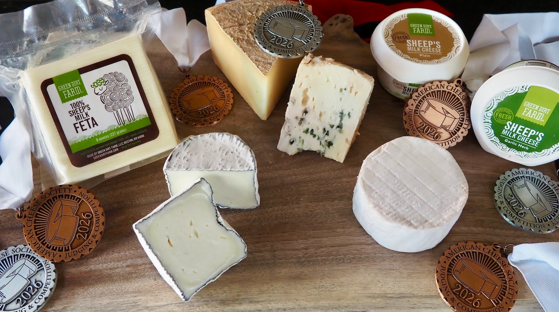 A board with Green Dirt Farm cheeses 